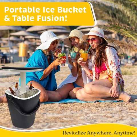 3-In-1 Resin Ice Bucket And Beverage Cooler Table For Outdoors With Lift Top Lid Wood-Look Side Table UV Protected And Drain Plug Party-Ready Poolside Patio Bar Entertaining Dark Black shown on a beach with group of people enjoying drinks.