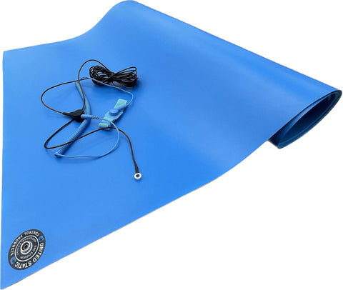Blue ESD mat kit with wrist strap and ground cord, top-down view showing certification seal.