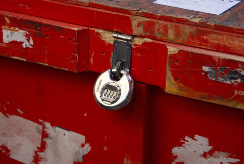 Heavy Duty 80mm Resettable Four Dial Padlock With Chrome Plated Hardened Steel Shackle on red toolbox