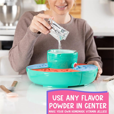 Person using Ultimate Gummy Candy Making Kit For Home Use With Four Mold Shapes And Heating Base, pouring powder