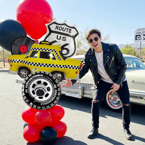 Route 66 Retro Party Balloons Kit With Vintage Car Tire Decor And Vinyl Record Foil Balloons shown with person outdoors