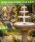 6.5W Solar Bird Bath Fountain With Lights, 3 tier DIY water feature in garden setting, solar panel, and birds on rim