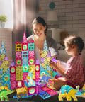 Child building with Magnetic Tiles Building Blocks Set For Kids 110 Pieces STEM Construction Toy With Dinosaur Figures