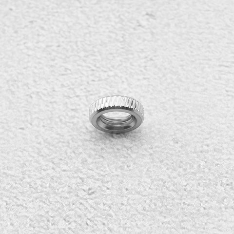 Close-up of a single Presta Valve Core Lock Ring Nut from 10 Pack Durable Metal Lock Rings for Presta Valves and Bicycle Inner Tubes.