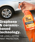 Person holding Nu Finish Graphene Coating spray in front of car, part of Two Piece Exterior Car Finishing Kit With Scratch Doctor Car Scratch Remover And Graphene Coating Spray For A Showroom Shine Easy Two Step Quick Process Delivers Dramatic Results That Last And Keeps Your Ride Protected