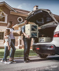 Family using Beige Stackable Storage Bins With Metal Frame For Closet Organization, loading them into car trunk