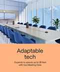 Boss Level 360 Degree 4K Smart Video Conference Camera set up in a modern boardroom with blue chairs and greenery.