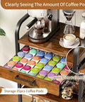 Top Shelf Five Tier Coffee Station Cart With Slick Rolling Wheels And Ample Cabinet Space Plus Sturdy Mounts For Single Serve Packs And Spacious Racks Built For Your Daily Grind Home Bar Display Or Cozy Kitchen Area showing drawer with 35 coffee pods.