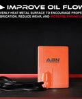 Heavy Duty Silicone Car Battery And Engine Block Heater Pad With Quick Ice Melter Shield, 4x5 inch, orange surface and power cord.