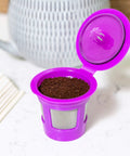 Two Item Bundle With Reusable K Cup Coffee Filters Four Pack And EZ Scoop 2 Tbsp Scoop With Integrated Funnel purple pod filled