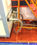 Clear Wire Reinforced Suction Hose 2 In ID X 2-5/16 In OD 10 Ft connected to machinery for fluid transfer.