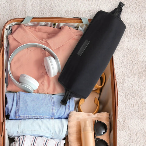 Travel Hair Tools Bag With Heat Resistant Mat 2 In 1 Organizer For Flat Irons Curling Irons And Straighteners in suitcase.