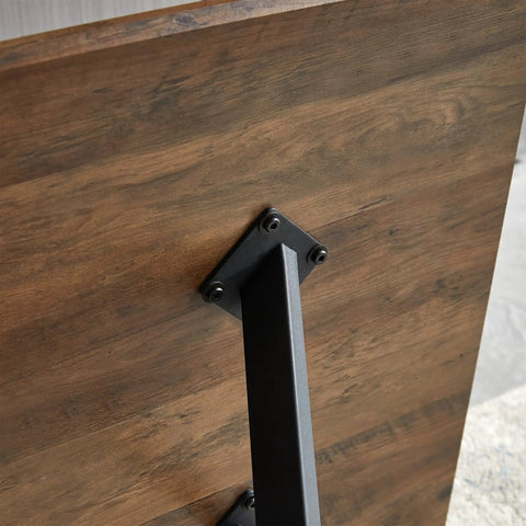 Modern Wood Top Dining Table With Sturdy Black Metal Base And Center Shelf For Kitchen Or Office With Rounded Child Safe Edges table leg detail showing walnut finish and strong support.