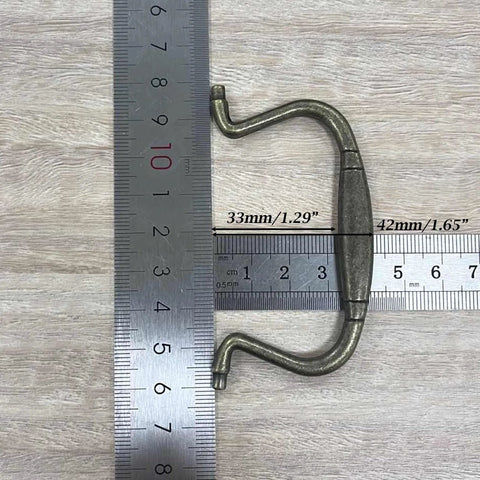 Antique Bail Pulls For Drawers And Cabinets Bronze Zinc Alloy Hardware With 3.1 Inch Center Spacing And 100x50mm Overall Size Includes Mounting Screws Retro Dresser Wardrobe Cabinet Knobs shown with ruler for size reference.