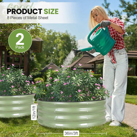 Person watering plants in Round Raised Garden Bed Set Of Two 3x3x1 Ft Heavy Duty Galvanized Steel Planter Boxes with flowers