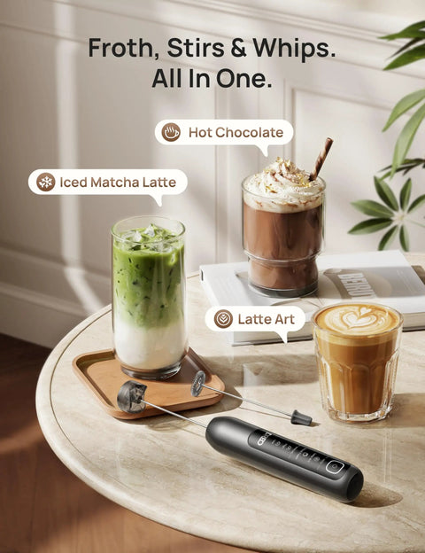 Handheld Milk Frother For Coffee Drinks Creates Silky Latte Art Foam In Minutes Quiet Electric Mixer Wand on table with drinks.