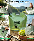 Heavy Duty Portable Camping Water Bag With Spigot For Outdoor Drinking, 8L, green, on a table by a lake with features highlighted