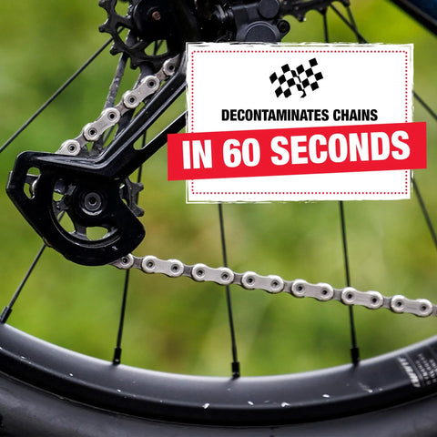 Pro Grade Bicycle Chain Cleaner Tool for Road Mountain Gravel and E Bikes Fast 60 Second Chain Cleaning System shown near bike wheel