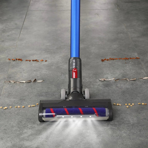 Motorized Vacuum Brush Attachment With LED Headlights for V7 V8 Cordless Vacuum Cleaners on a tiled floor with debris.