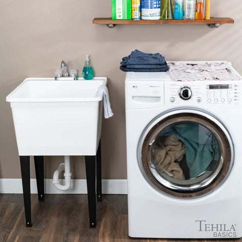 Heavy Duty Plastic Laundry Tub Featuring A Spacious 21 Gallon Basin With Sturdy Adjustable Freestanding Frame And Sleek Two Handle Faucet For Quick Household Cleanups No Sweat, adjacent to washing machine.