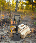 Folding Shovel For Camping And Hiking Durable Collapsible Entrenching Tool with wood logs outdoors