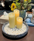 12 Inch Wooden Lazy Susan With Mother Of Pearl Inlay Smooth Spinning Turntable Serving Tray with candles and flowers on a table