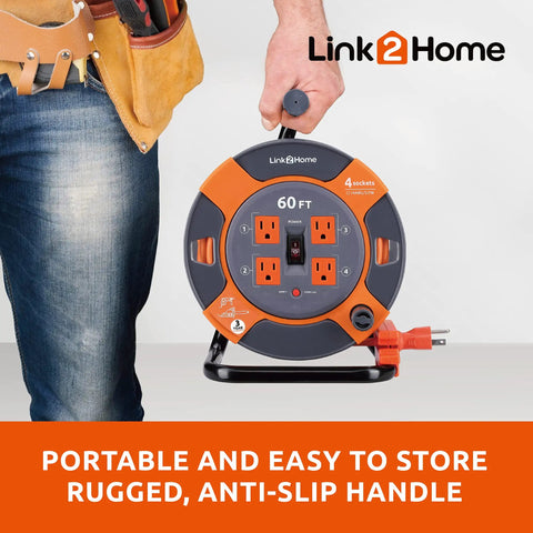 Man holding 60 Ft Cord Reel With Four Outlets 14 AWG SJTW Cable Workhorse, orange and grey design, Link2Home logo visible.