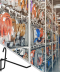 Close-up of a black 4 Inch Grid Wall Hooks Set 25 Pcs Stainless Steel Grid Panel Hangers for organizing tools in a garage