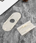 Six Pack Bee Escape Equipment Set 109 By 42 Mm Plastic Hive Doors With 21.7mm Hole showing two-piece construction on stone surface