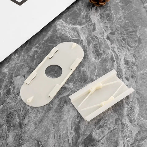 Six Pack Bee Escape Equipment Set 109 By 42 Mm Plastic Hive Doors With 21.7mm Hole showing two-piece construction on stone surface