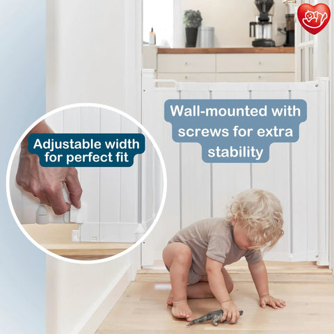 Guard Me Retractable Safety Gate for Extra Wide Openings 21.6 to 44.6 Inches installed on stairs, toddler sitting nearby.