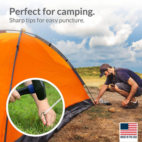Man securing tent with 30 Pack Tent Stakes 9 Inch Galvanized Steel Ground Spikes With 1 Inch Hook Built Tough Rust Resistant 8 Gauge For Tents Fences Tarps Decorations Inflatables Outdoor Use Made In USA