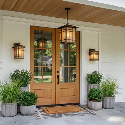 Exterior view with Hillcrest 13 Inch Mission Style Outdoor Wall Sconce Imperial Bronze with Linen Glass beside a wooden door
