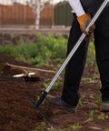 Person using 15 Inch Wide Bow Rake With 16 Steel Tines And Stainless Steel Handle For Loosening Soil Leveling Mulch Gathering Leaves And Lawn Care Built Tough Garden Tool in a garden