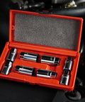 8 Piece Stud Extractor Set For SAE And Metric, Broken Stud Removal Sockets in orange case, shown in automotive setting
