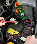 400A True RMS AC Clamp Meter With Non Contact Voltage Detection, 1.2 Inch Jaw in use measuring car battery voltage