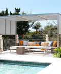 Shade-covered patio with sectional sofa under Nine By Twenty Foot Shade Cloth With Grommets For Outdoor Shade Stay Cool UV Protected HDPE Fabric