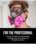 Person wearing respirator with Pink P100 Particulate Filters 2091 07000 Two Pack For Non Oil Based Particulates NIOSH Approved