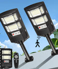 Top Shelf Solar Street Lights Outdoor Waterproof 2 Pack Led Flood Lamp 10000 Lumen mounted with solar panel and remote control.