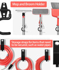 Mop and broom holder with black steel hook, showcasing straps for securing items, part of Badass Heavy Duty Garage Hooks.