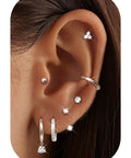 Lightweight Hypoallergenic Silver Earring Stacks For Women 7 Pair Set Lets You Mix And Match CZ Studs Ear Jackets Ball Studs Butterflies Hoops And More In Stainless Steel For Sensitive Ears, side view