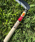 Japanese Weeding Sickle Kama For Fast Garden Cleanup, 4.7 Inch Serrated Blade, Curved Pull Cut Design on grass