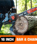 Person using 60V 16 Inch Cordless Chainsaw With Brushless Motor, 1800W Power, 26m/s Chain Speed for wood cutting outdoors.