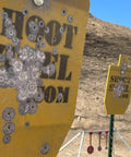 Half Inch AR500 Steel Target Silhouette 12 By 20 Inch with bullet impacts in a shooting range setup for rifle practice