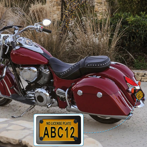 Red motorcycle with Badass Matte Black Stainless Steel Motorcycle License Plate Frame With Heavy Duty Tag Holder attached.