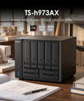 Heavy Duty Nine Bay NAS Server With Blazing Fast AMD Ryzen Quad Core And 32GB RAM showcasing sleek design on wooden desk.