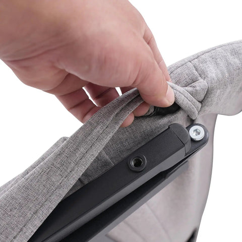 Hand adjusting the removable gray cushion cover on Heavy Duty Electric Bed Backrest With Guardrail For Elderly Support.
