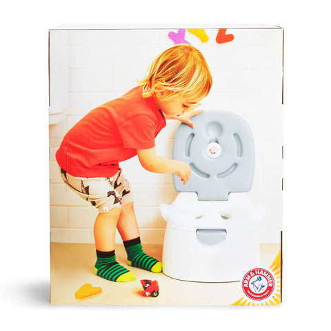 A toddler exploring The Real Deal Toddler Potty Training Chair 3-In-1 Potty Seat With Step Stool Plus Arm And Hammer Deodorizing Disc Gray.