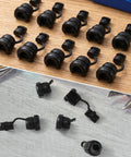 Heavy Duty Black Nylon Strain Relief Cord Connectors 6N 4 Model Pack of ten black nylon strain relief boots on a wooden surface.