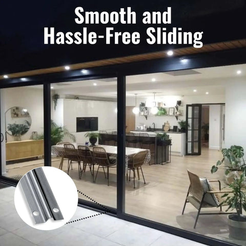 Installed stainless steel sliding glass door track with screw-down lower inverted V bottom, satin anodized finish, 72 inch length.